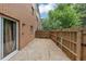 Enclosed patio area featuring a concrete surface and wood fence, perfect for private outdoor enjoyment at 4701 Flat Shoals Road Rd # 37H, Union City, GA 30291