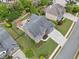 Beautiful home with an expansive backyard featuring a patio, fire pit, outdoor kitchen, and lush landscaping at 508 Highland Drive Dr, Woodstock, GA 30188