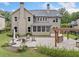 Home exterior with a patio, pergola with outdoor grill, fire pit and fenced yard at 508 Highland Drive Dr, Woodstock, GA 30188
