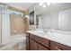 Well-lit bathroom with a shower-tub combination, tan tile, and white countertops and cabinetry at 508 Highland Drive Dr, Woodstock, GA 30188
