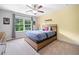 Bedroom featuring natural light, ceiling fan, and neutral decor at 508 Highland Drive Dr, Woodstock, GA 30188