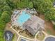 Aerial view of community pool with a slide, area, and many lounge chairs at 508 Highland Drive Dr, Woodstock, GA 30188