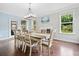 Bright dining room with a dining table set and hardwood floors at 508 Highland Drive Dr, Woodstock, GA 30188