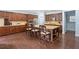 Kitchen with stainless steel appliances, granite countertops, island with seating and hardwood floors at 508 Highland Drive Dr, Woodstock, GA 30188