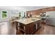 Open kitchen with stainless steel appliances and a spacious island at 508 Highland Drive Dr, Woodstock, GA 30188