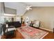 Spacious living room with high ceilings, hardwood floors, and a cozy seating area perfect for relaxing at 726 Sunset Ridge Ln, Lawrenceville, GA 30045