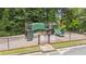 The image shows a neighborhood playground with various play structures at 726 Sunset Ridge Ln, Lawrenceville, GA 30045