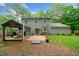 Home backyard features a gazebo, patio, and lawn, creating a welcoming outdoor living space at 802 Bluff Pl, Woodstock, GA 30188