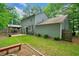 Large backyard boasts a gazebo, patio, and grassy area, ideal for outdoor enjoyment at 802 Bluff Pl, Woodstock, GA 30188