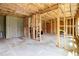 Unfinished basement with concrete floor, wooden framing and exposed ceiling, offering space for customization at 25 Running Terrace Way, Cartersville, GA 30121