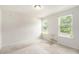Bedroom featuring neutral carpet, two windows providing natural light, and walls ready for personalization at 25 Running Terrace Way, Cartersville, GA 30121