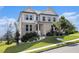 Two-story home with brick and siding, landscaped lawn on a beautiful sunny day at 25 Running Terrace Way, Cartersville, GA 30121