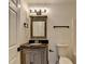 Updated bathroom with modern vanity, granite countertop, updated fixtures, and ample light at 2803 Snapfinger Manor Mnr, Decatur, GA 30035