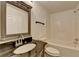 Bathroom with granite vanity, decorative mirror, and shower/tub combo at 2803 Snapfinger Manor Mnr, Decatur, GA 30035