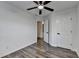 Bedroom with ceiling fan, open door and modern, neutral flooring at 2803 Snapfinger Manor Mnr, Decatur, GA 30035