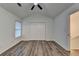 Spacious bedroom featuring wood-style floors, large closet, and vaulted ceilings at 2803 Snapfinger Manor Mnr, Decatur, GA 30035