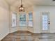Bright dining area features wood-look floors and a bay window with natural light at 2803 Snapfinger Manor Mnr, Decatur, GA 30035