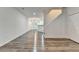 Bright living room with stairs, neutral walls, recessed lighting, and stylish wood-look flooring at 2803 Snapfinger Manor Mnr, Decatur, GA 30035