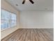 Spacious room features wood-look floors and a large window for natural light at 2803 Snapfinger Manor Mnr, Decatur, GA 30035