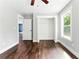 Bright bedroom featuring hardwood floors and a closet with open doors at 38 Creek Se Dr, Cartersville, GA 30121