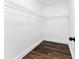 Walk-in closet with hardwood floors and metal shelving at 38 Creek Se Dr, Cartersville, GA 30121