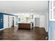 Spacious open-concept kitchen with sleek white cabinets and a stylish center island, perfect for entertaining at 38 Creek Se Dr, Cartersville, GA 30121