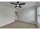 Bedroom showcasing neutral carpeting, fresh paint, bright lighting and a standard doorway and a window at 7196 Toccoa Circle, Union City, GA 30291