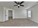 Bedroom showcases neutral carpet and freshly painted walls, creating a bright and inviting space at 7196 Toccoa Circle, Union City, GA 30291
