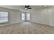 Large bedroom features neutral carpeting and ceiling fan at 7196 Toccoa Circle, Union City, GA 30291