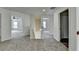 Hallway with multiple entry points, carpet flooring and white molding at 7196 Toccoa Circle, Union City, GA 30291