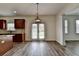 Kitchen area with granite countertops, hardwood floors, and stainless steel appliances at 7196 Toccoa Circle, Union City, GA 30291