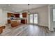 Modern kitchen with granite countertops, stainless steel appliances, and hardwood floors at 7196 Toccoa Circle, Union City, GA 30291