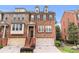Charming brick townhome with a well-maintained lawn and convenient attached two-car garage at 2428 Hadlow Ln # 25, Atlanta, GA 30339