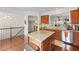 Spacious kitchen with granite countertops, stainless steel appliances, and center island for entertaining at 2428 Hadlow Ln # 25, Atlanta, GA 30339