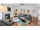 Cozy living room with a fireplace and a comfortable sectional sofa at 2428 Hadlow Ln # 25, Atlanta, GA 30339