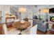 Open concept living room with a view of the dining area and staircase at 2428 Hadlow Ln # 25, Atlanta, GA 30339