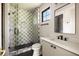 Charming bathroom with a tiled shower, updated vanity and fixtures at 2609 Dogwood Terrace Ne, Atlanta, GA 30319