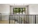 Upstairs foyer featuring modern lighting and a large window at 2609 Dogwood Terrace Ne, Atlanta, GA 30319