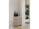 Stylish hallway featuring sleek cabinetry, modern decor, and a glimpse into a naturally lit office space at 2609 Dogwood Terrace Ne, Atlanta, GA 30319