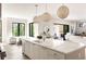 Bright and airy kitchen with a large island, sleek cabinetry, and an open view to the living room at 2609 Dogwood Terrace Ne, Atlanta, GA 30319
