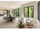 Bright living room with hardwood floors, large windows, and stylish decor at 2609 Dogwood Terrace Ne, Atlanta, GA 30319