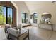 Bright main bedroom with seating area and large windows overlooking nature at 2609 Dogwood Terrace Ne, Atlanta, GA 30319