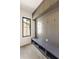 Mud room area with storage, bench, and modern finishes at 2609 Dogwood Terrace Ne, Atlanta, GA 30319