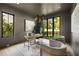 Chic home office featuring modern decor, natural light from large windows, and sophisticated color palette at 2609 Dogwood Terrace Ne, Atlanta, GA 30319