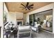 Covered patio with an outdoor fireplace, comfortable seating, and seamless indoor-outdoor transition at 2609 Dogwood Terrace Ne, Atlanta, GA 30319