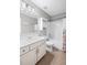 Clean bathroom with a vanity, toilet and tub/shower with simple decorations at 3420 Pleasant Springs Dr, Cumming, GA 30028