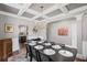 Sophisticated dining room with a stylish chandelier and well-appointed table setting at 3420 Pleasant Springs Dr, Cumming, GA 30028