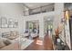 Elegant living room featuring hardwood floors and a view of the dining area at 3420 Pleasant Springs Dr, Cumming, GA 30028
