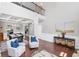 Open concept living room showcasing elegant decor and a view of the dining area at 3420 Pleasant Springs Dr, Cumming, GA 30028