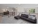 Upstairs loft area with comfortable seating and natural light at 3420 Pleasant Springs Dr, Cumming, GA 30028